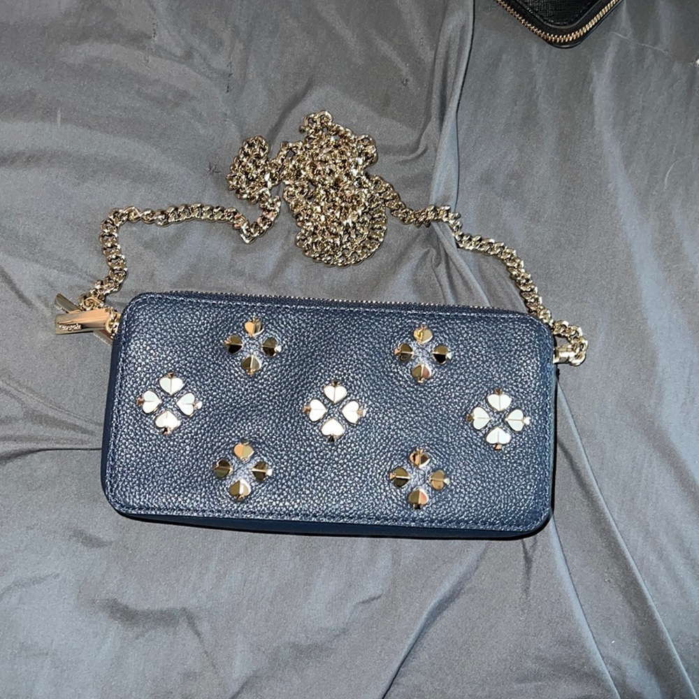 Navy blue Kate Spade crossbody mini bag with chain